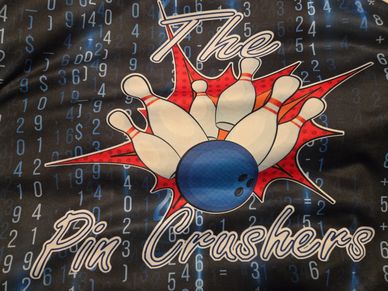Logo of 'The Pin Crushers' bowling team with pins and ball.