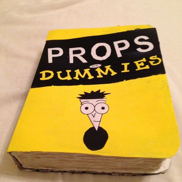 A fake book entitled "Props for Dummies" 