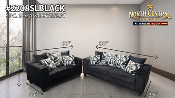 Black 2-piece sofa and loveseat set with patterned cushions in a modern living room.
