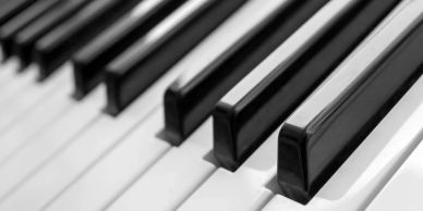 Close-up of piano keys in black and white.
