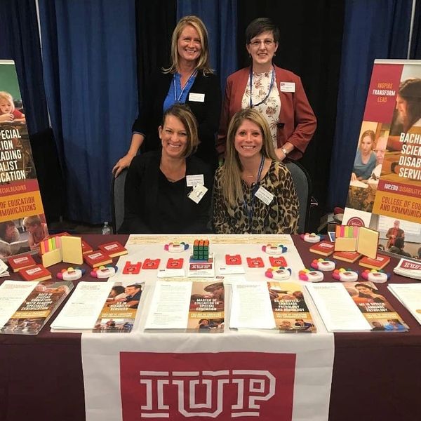 Kaylee with IUP colleagues at an Assistive Technology Conference in 2018. 