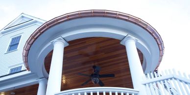 A low angle view of a round balcony