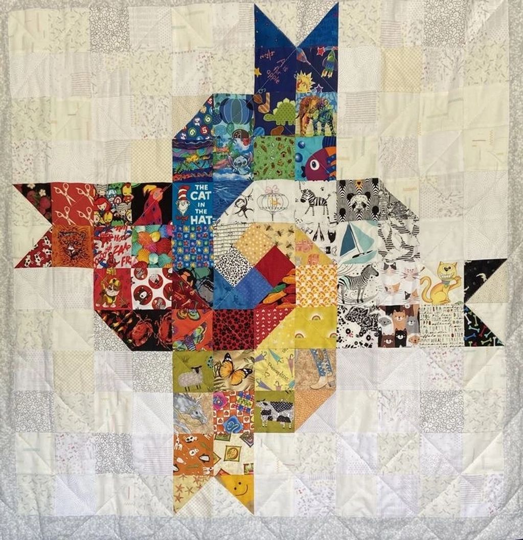 Who doesn't love this 4 Cats Modern Baby Quilt from Episode 22. Watch the video for assembly.