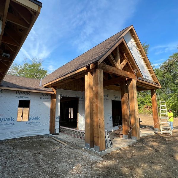 huge covered deck with huge 12x12 cedar post and cedar framing