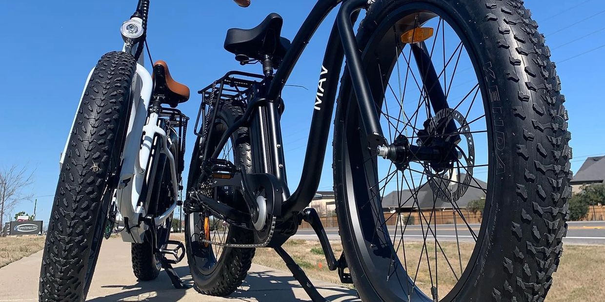 White and Black fat tire MAV Electric Bikes.