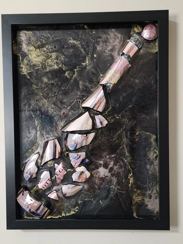 Framed shattered rose gold Bottega bottle art.