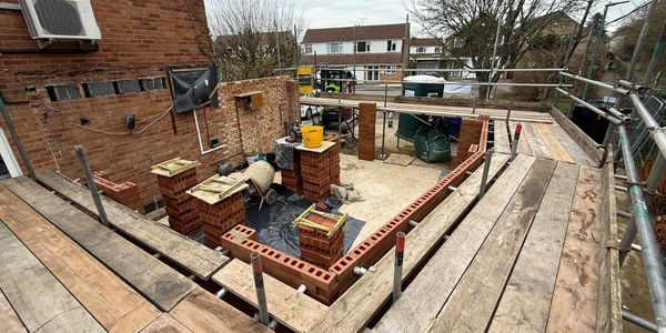 Scaffolding around an extension.