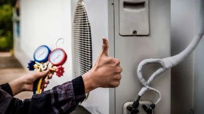 Meyers Heating and Cooling fixing HVAC unit in Fredericksburg, VA
