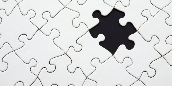A missing puzzle piece representing tailored marketing strategies to complete your business success