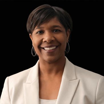 Professional woman smiling confidently against a black background.