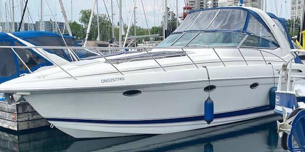 Image of a 2002 FORMULA 37 PC powerboat at the dock in Toronto, For Sale by Breezeway Yachts.