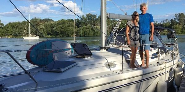 Perry and Cheryl Woodman of their deck on the Catalina 42mkII