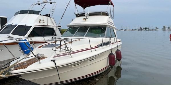 image of a 1984 Sea Ray 340 Sedan Bridge at the dock in Whitby, Ontario, For Sale by Breezeway Yacht