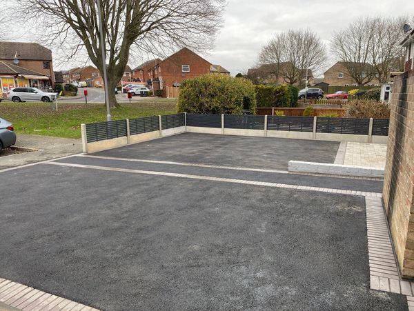 A large layer of fresh hot asphalt / residential area
