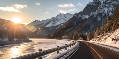 Paved road with winter mountain scenery