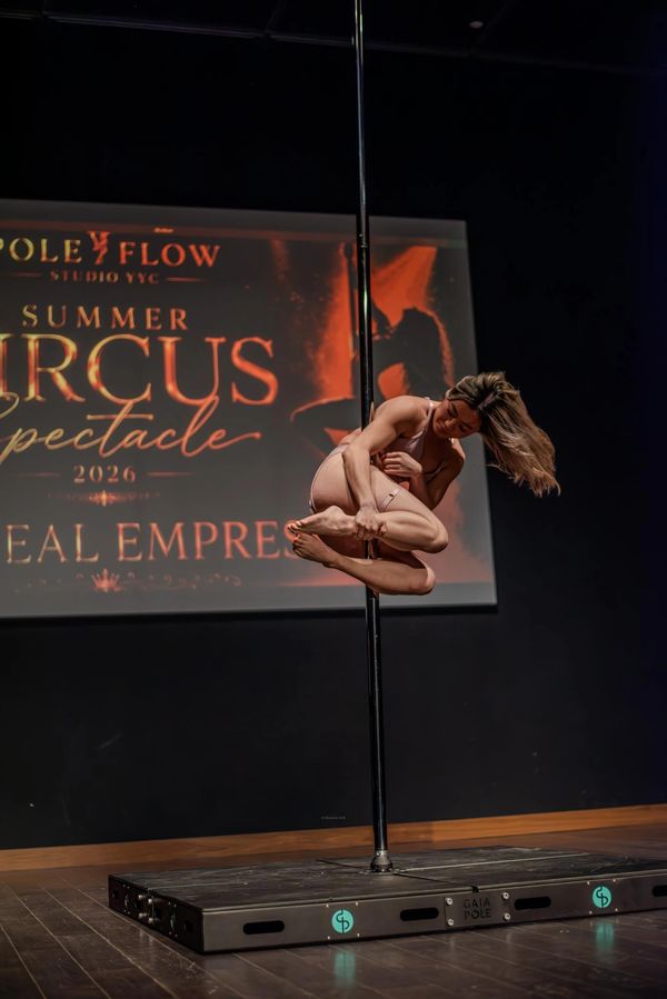 Student Pole and Aerial Hoop performer showcasing artistry strength, confidence and fitness growth
