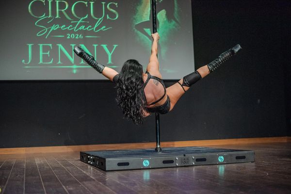 Student Pole and Aerial Hoop performer showcasing artistry strength, confidence and fitness growth
