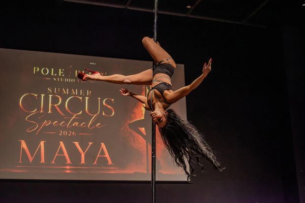 Student Pole and Aerial Hoop performer showcasing artistry strength, confidence and fitness growth