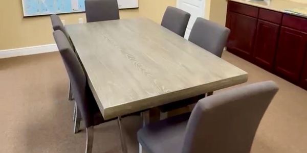 Conference room table and chairs at our office. 