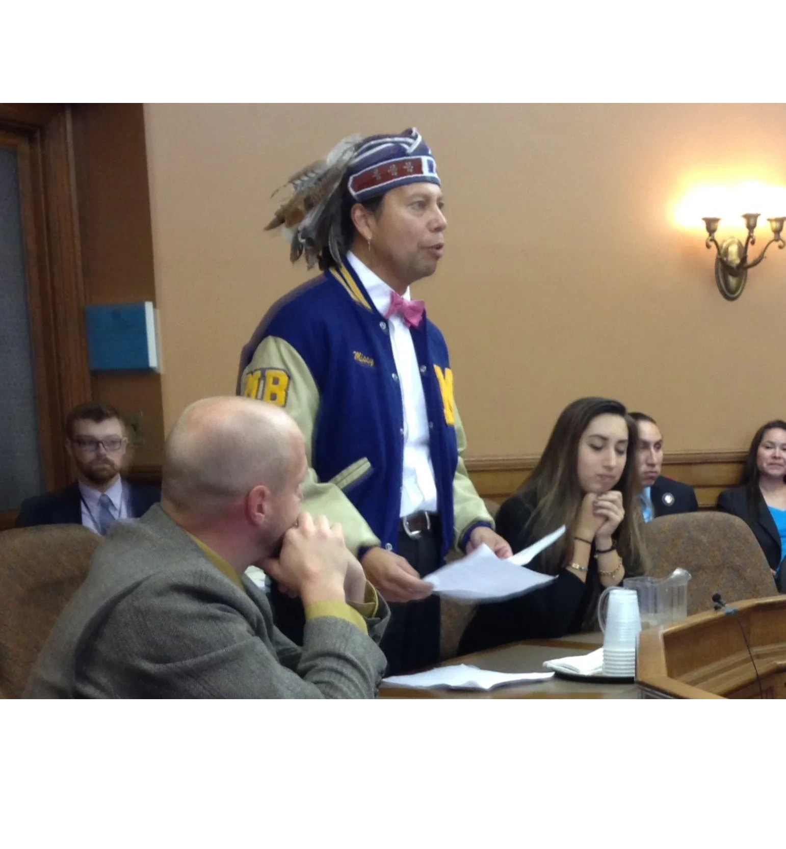 giving testimony at the Wisconsin state capitol