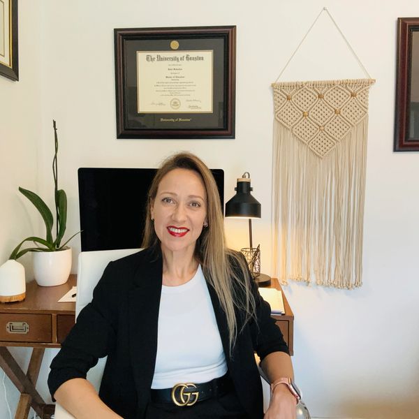 A depression, anxiety and couples therapist sitting 