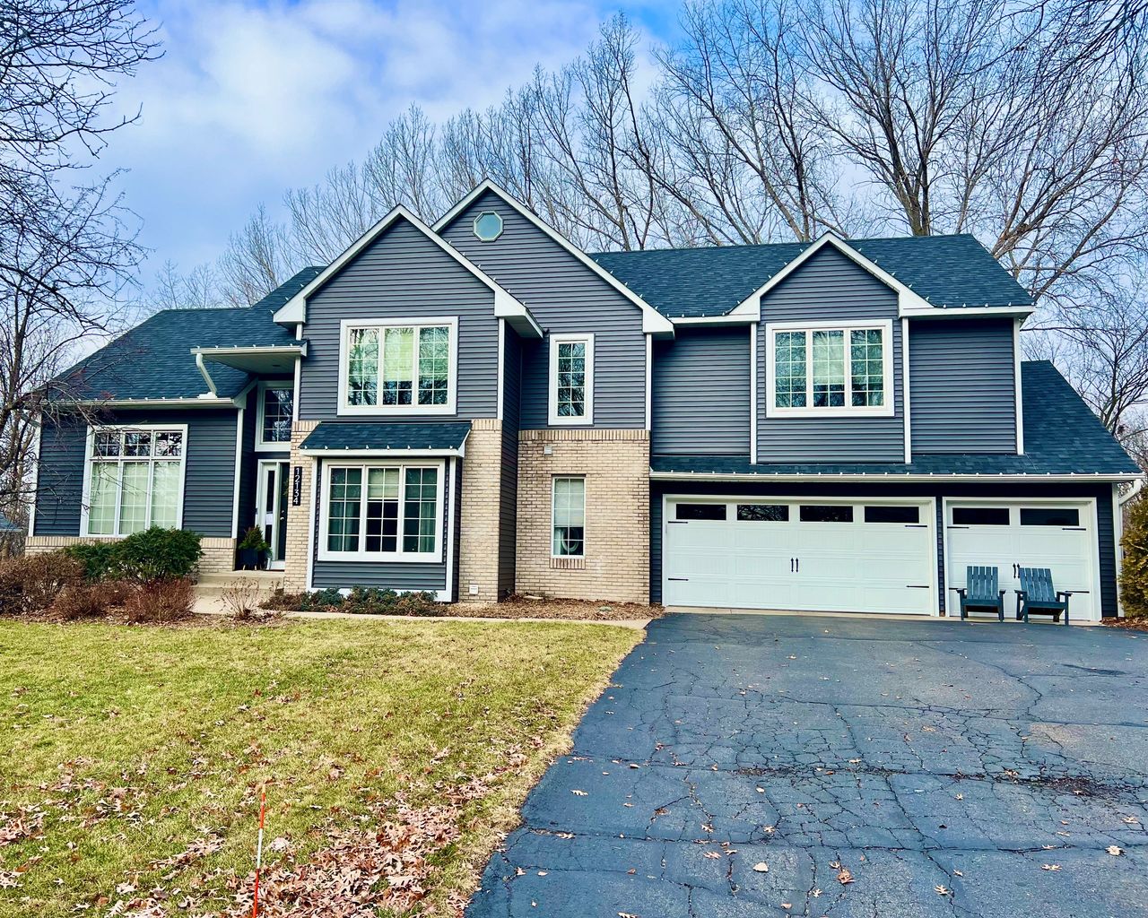 Twin Cities home with refreshed roof and siding showing strong curb appeal
