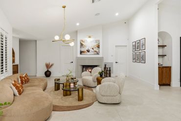 Stylish living room with modern furniture and fireplace.