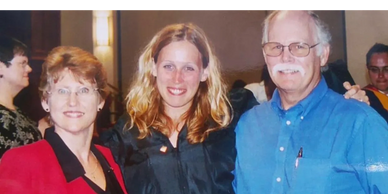 Kellie Knolles with her parents when she graduated from the University of Oklahoma in Norman.
