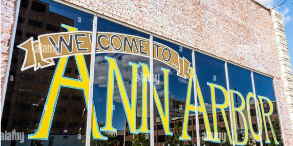 Sign reading 'Welcome to Ann Arbor' on a building.