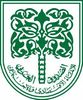 Emblem with green symmetrical patterns and Arabic text.
