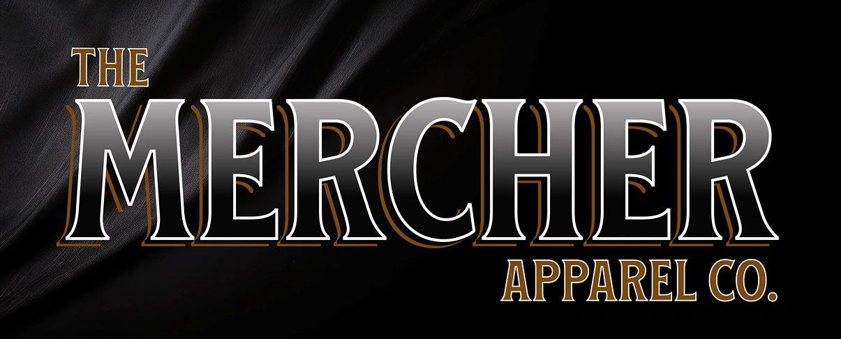 Logo of The Mercher Apparel Co. on a black fabric background.