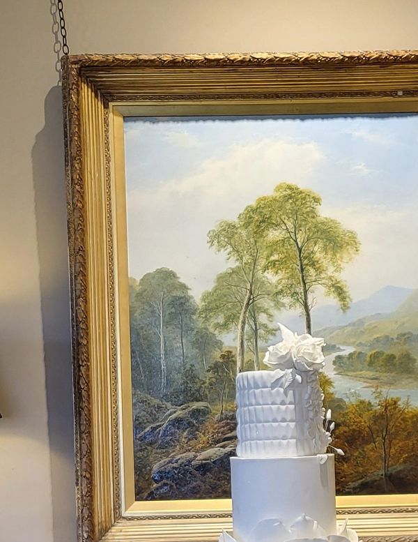 Three tier white wedding cake