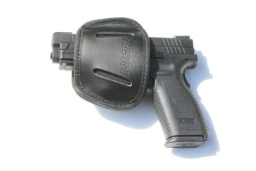 Handgun with a black holster.