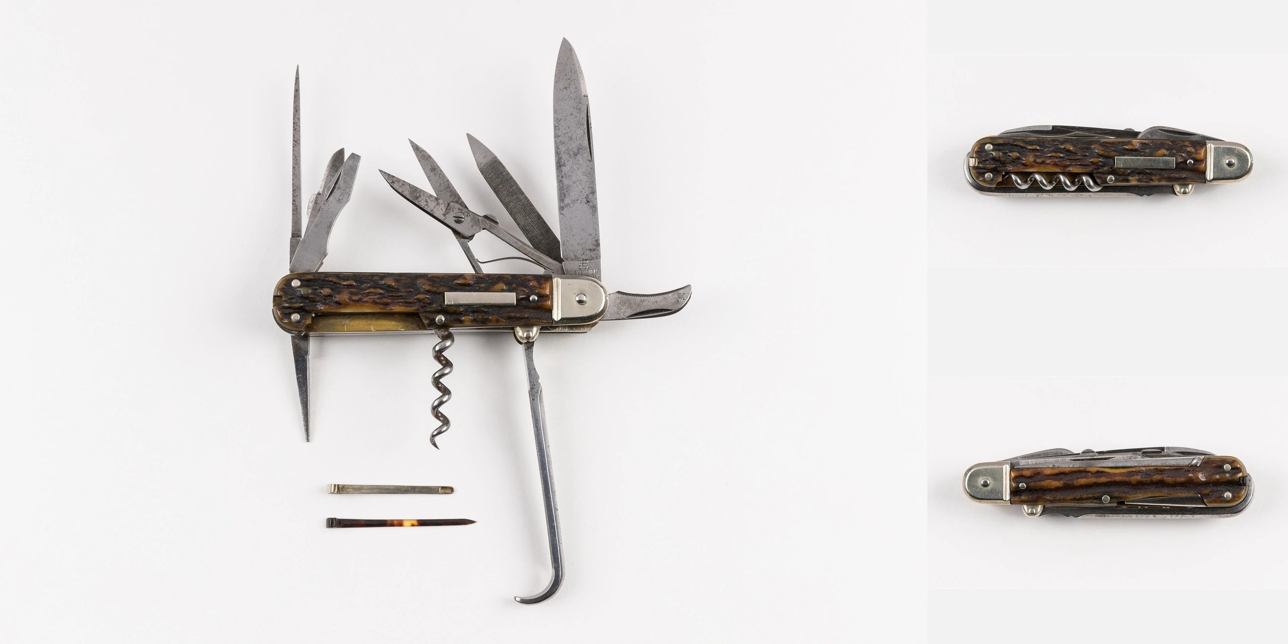Vintage multi-tool pocket knife with various tools unfolded and folded.