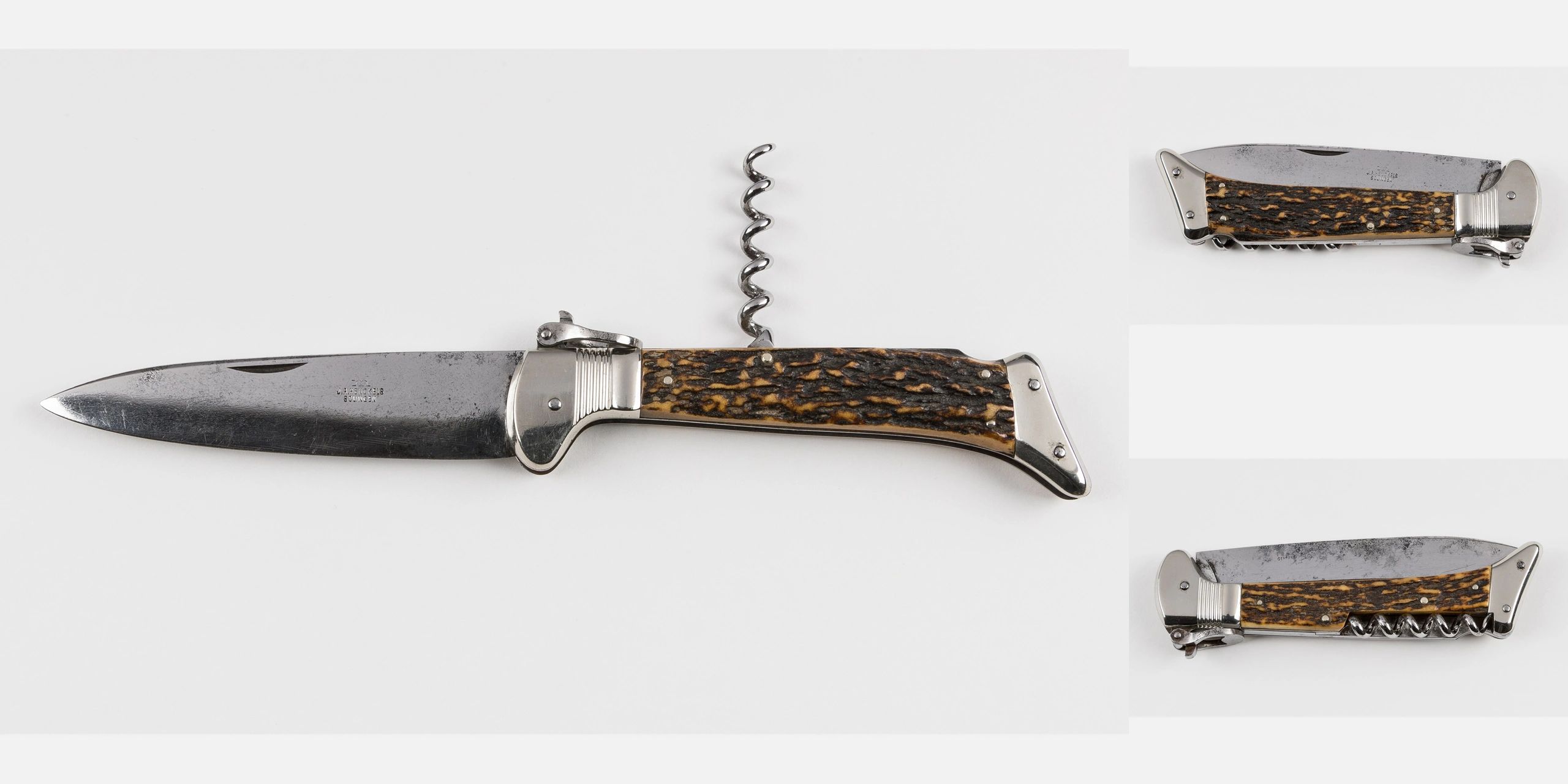 Vintage folding knife with corkscrew and textured handle.