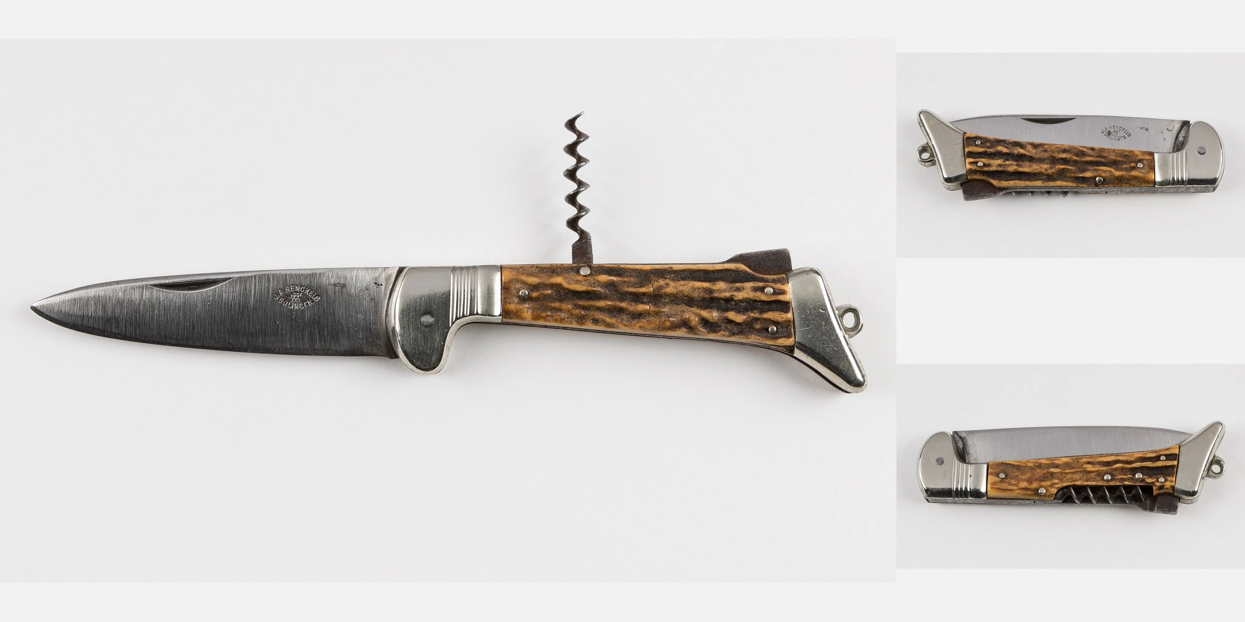 Vintage folding knife with wooden handle and corkscrew.