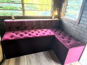 We created a custom, tufted, velvet storage bench. Functional and elegant!