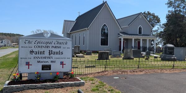 Saint Pauls Episcopal Church and cemetery in Marion, Maryland on a sunny day.