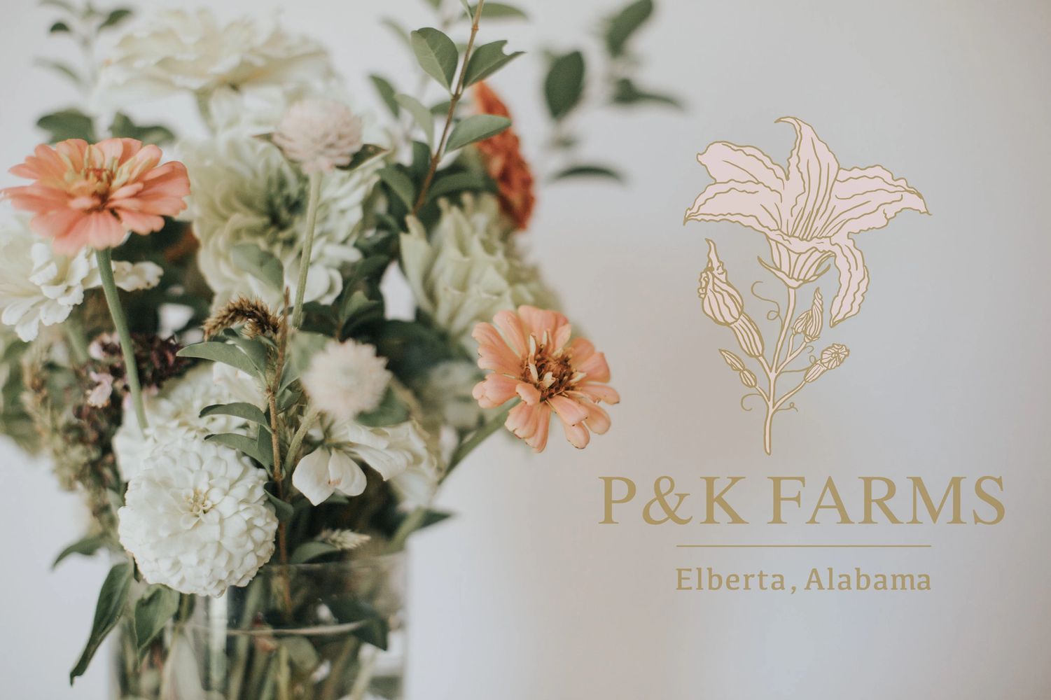 Fresh farm-grown white and peach cut flowers with flower farm logo. Zuemy Bourque Photography