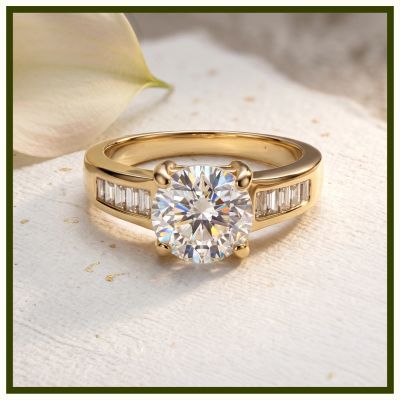 Gold ring with a large central diamond and smaller baguette diamonds on the band.
