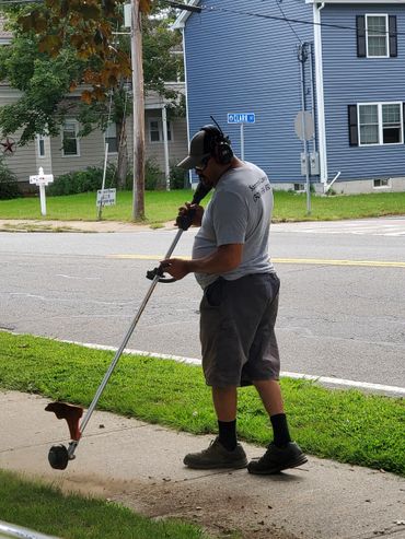 Owner weed whacking