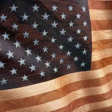 Wooden American flag with stars and stripes.