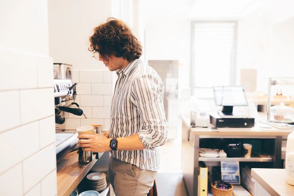 Barista in a flexible workspace cafe