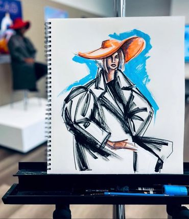 Fashion sketch of a woman wearing a large orange hat and oversized coat.