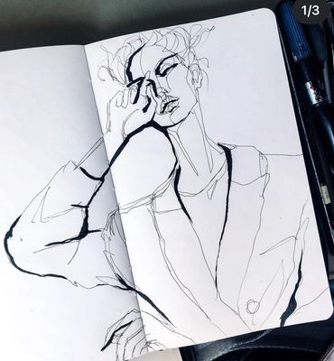 Minimalist ink sketch of a person rubbing their eye in a notebook.