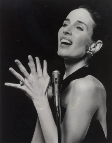 Andrea Marcovicci sings at the microphone at The Plush Room