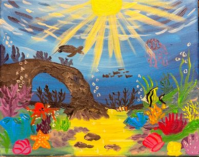 Colorful underwater scene with fish, coral, and sun rays.