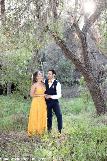 Boho style man and woman romantic couple in the woods