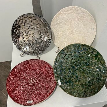 four ceramic plates