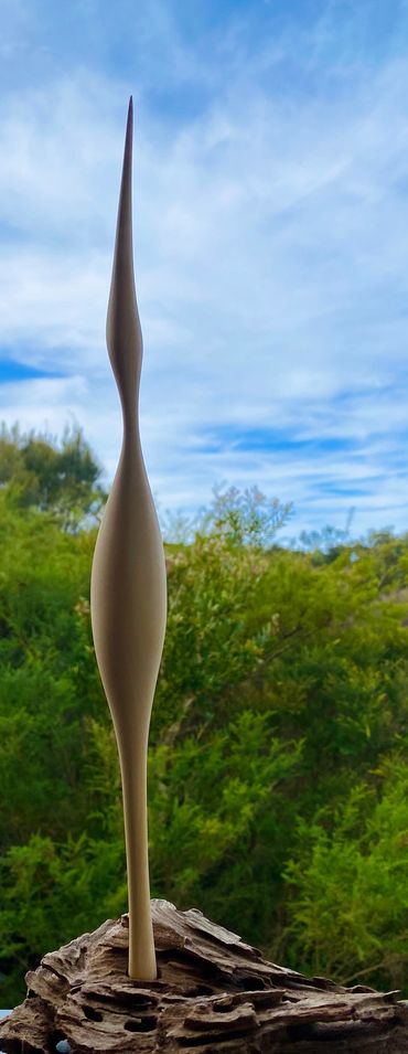 abstract wood sculpture of bird